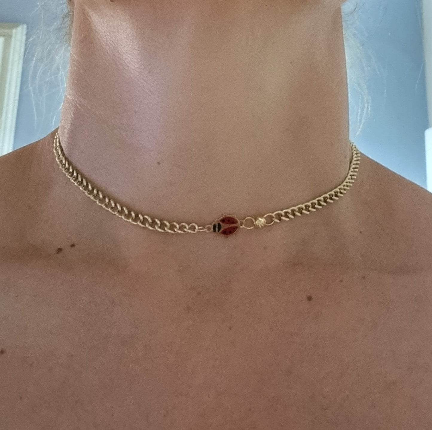 Collana in ottone e charm smaltato