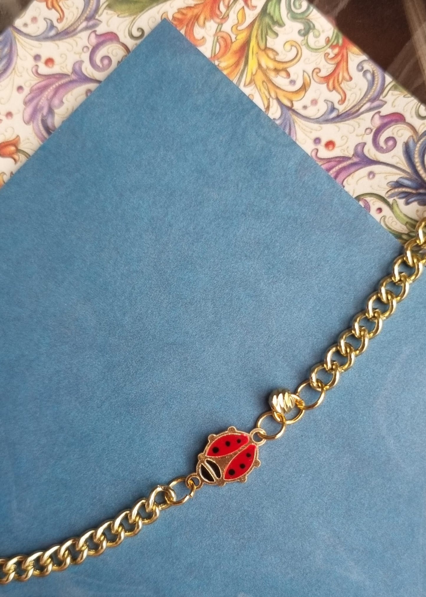 Collana in ottone e charm smaltato