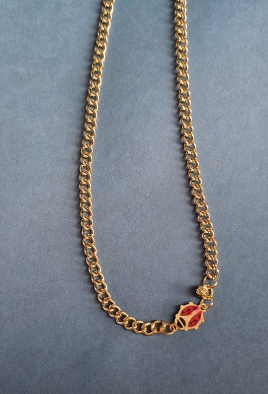 Collana in ottone e charm smaltato